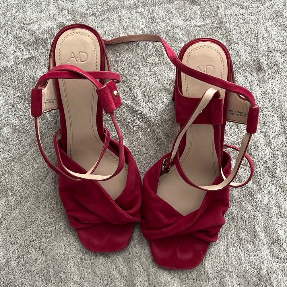 Maroon colored leather, heeled sandals, size 8.5